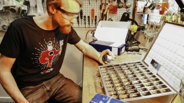 Quick Key tech rekeying a deadbolt lock Quick Key tech rekeying a deadbolt lock