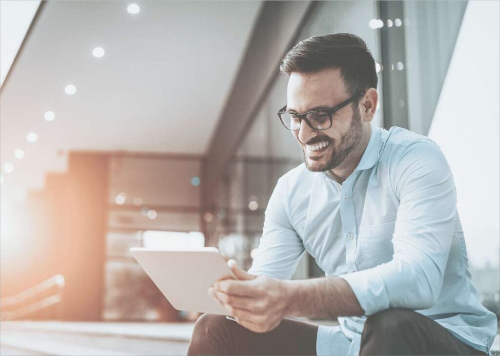 man using tablet office man using tablet office
